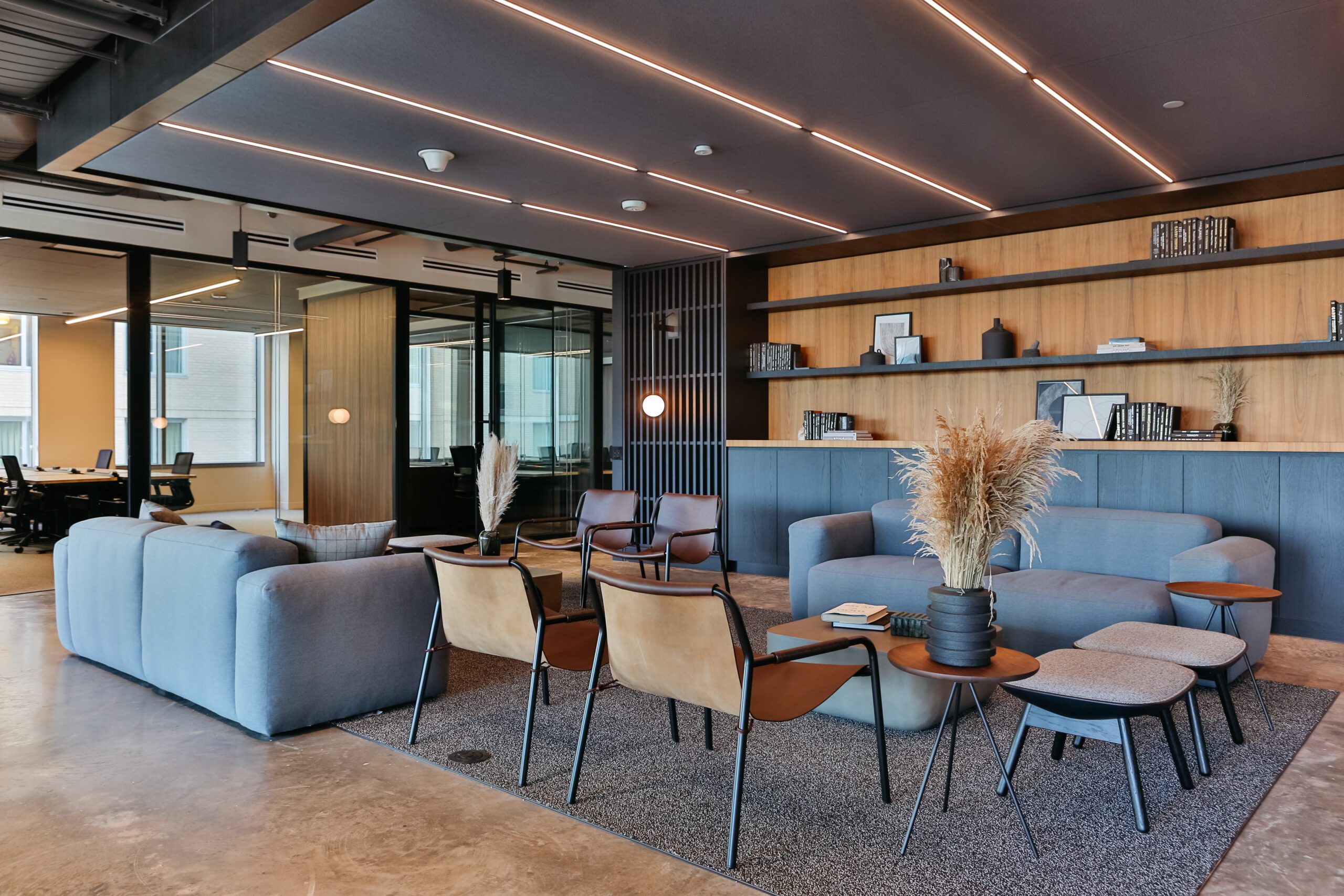 a lounge area inside a launch workplaces coworking space with modern furniture and elegant design