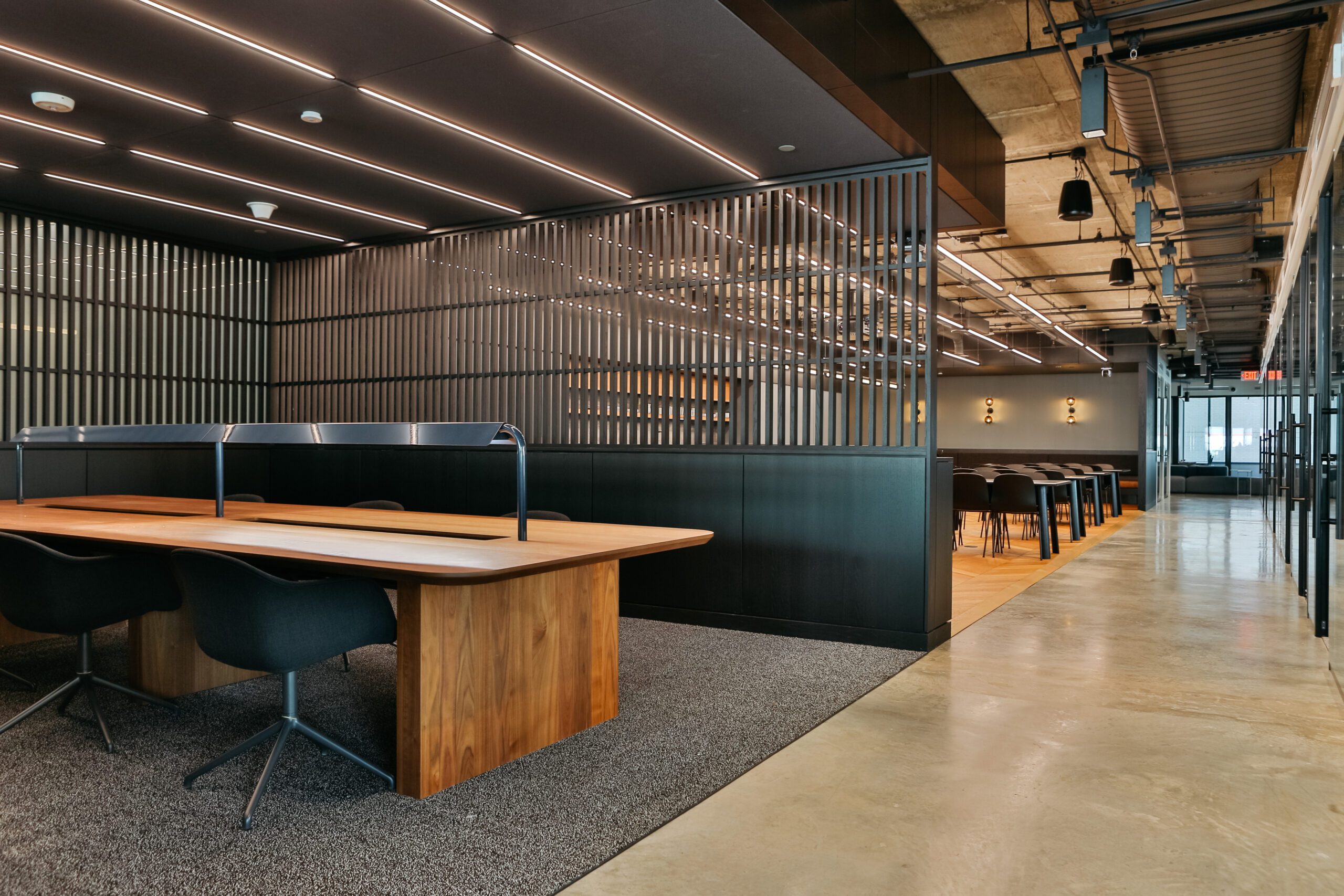 an open place workspace with hot desks in a beautifully designed modern coworking space